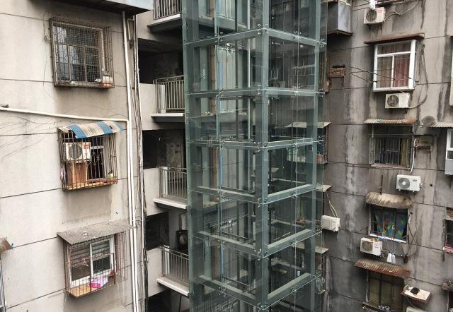 人妻精品久久无码区:北京加装电梯政策最新,北京加装电梯政策最新动态，探索人妻精品生活与社区电梯建设的和谐共生之道